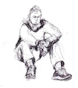 Drawing of a man sitting on the floor