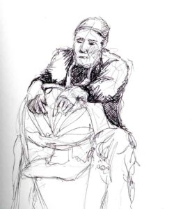 Drawing of a man resting his hands on a chair back