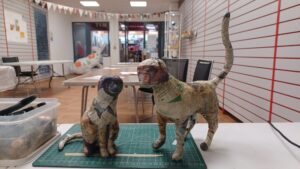 some partly finished papier mache cats