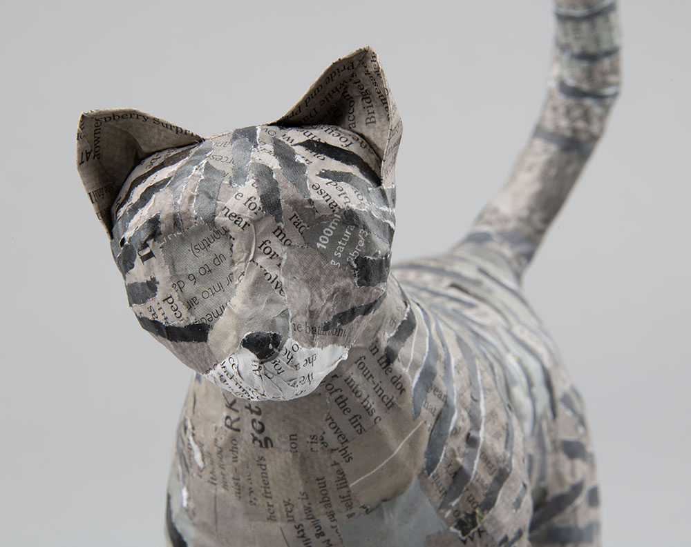 Head of a papier mache tabby cat